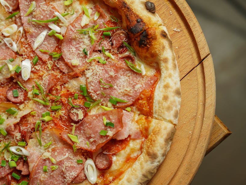 Seasonal prosciutto fig pizza special